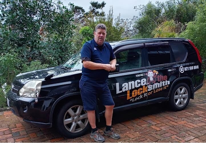 Lance the Locksmith standing next to his car from which he operates his mobile services in the Hutt and Petone.